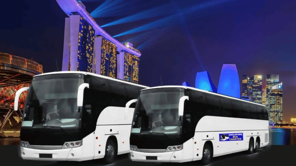 Singapore Bus Charter coaches with the Marina Bay skyline
